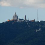 Tibidabo amusement park and Sagrat Cor church seen from Montjuic castle